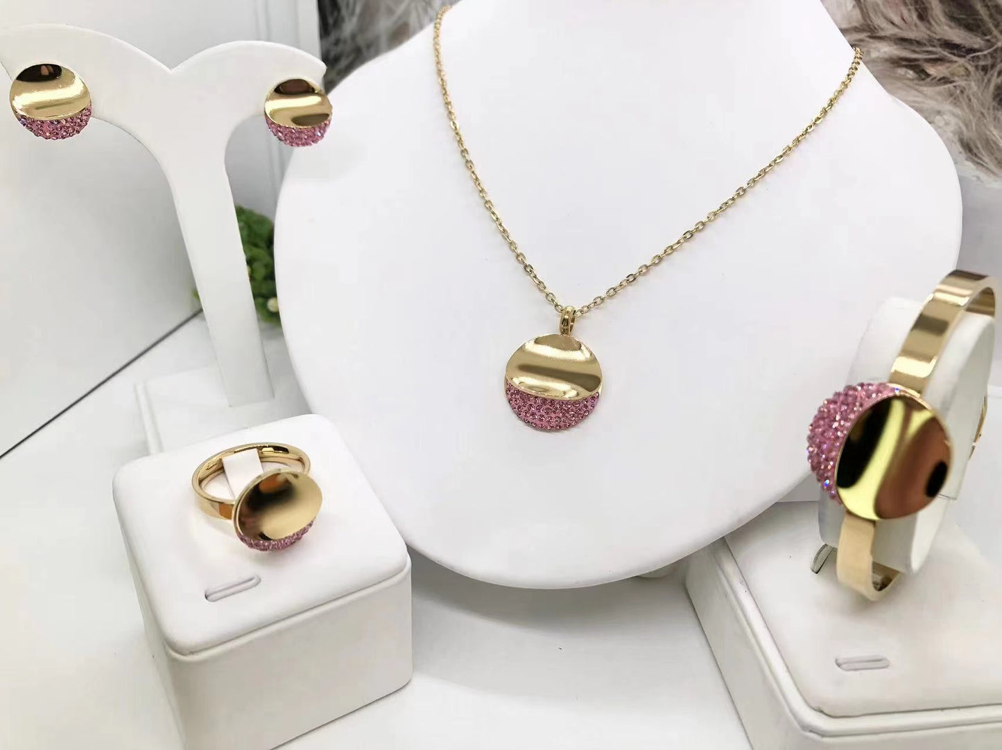 Gorgeous women's stainless steel necklace, earrings, bracelet, and ring set