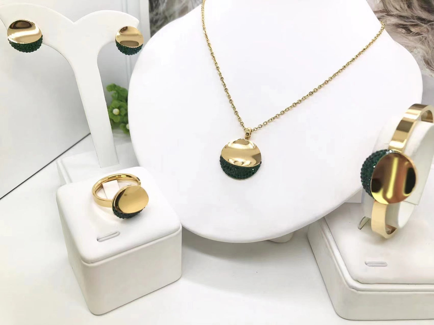 Gorgeous women's stainless steel necklace, earrings, bracelet, and ring set