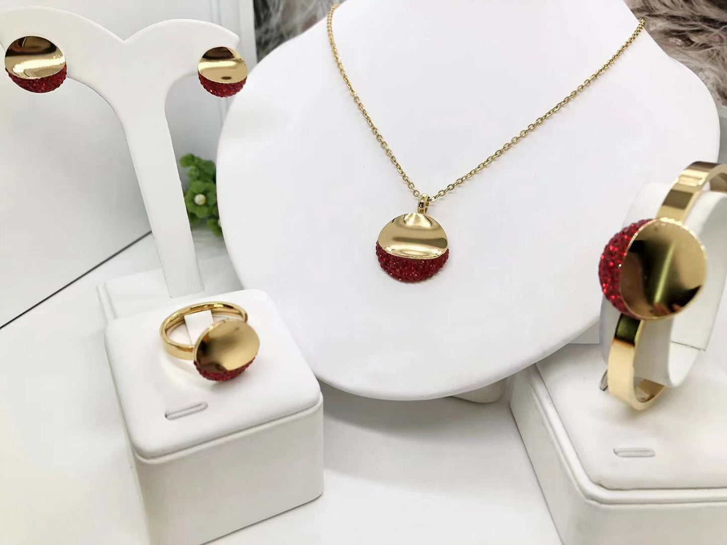 Gorgeous women's stainless steel necklace, earrings, bracelet, and ring set