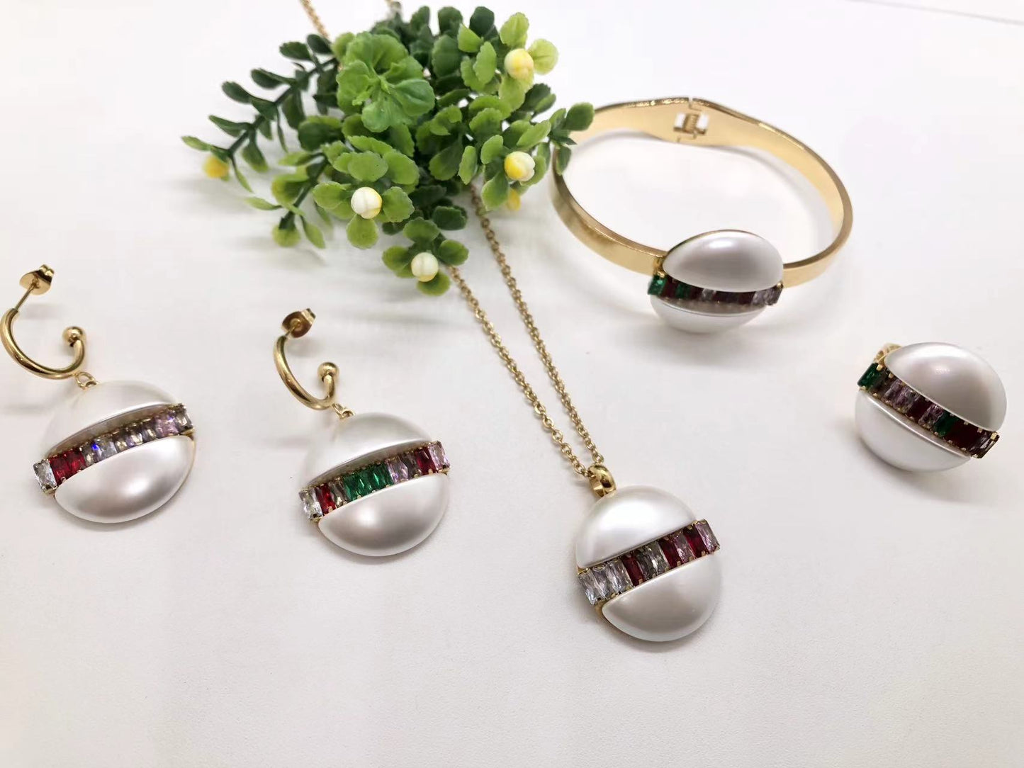 Gorgeous women's stainless steel necklace, earrings, bracelet, and ring set
