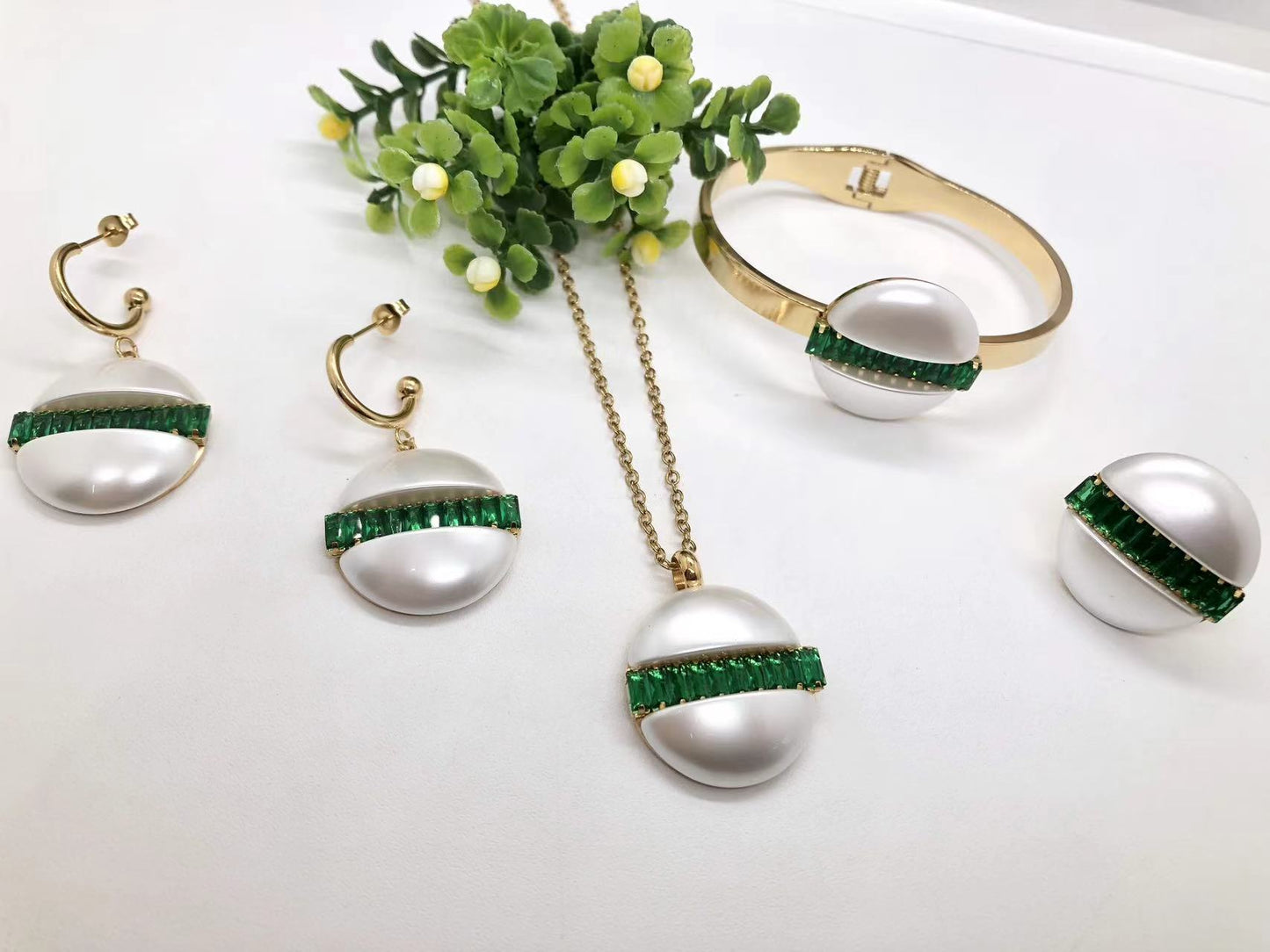 Gorgeous women's stainless steel necklace, earrings, bracelet, and ring set