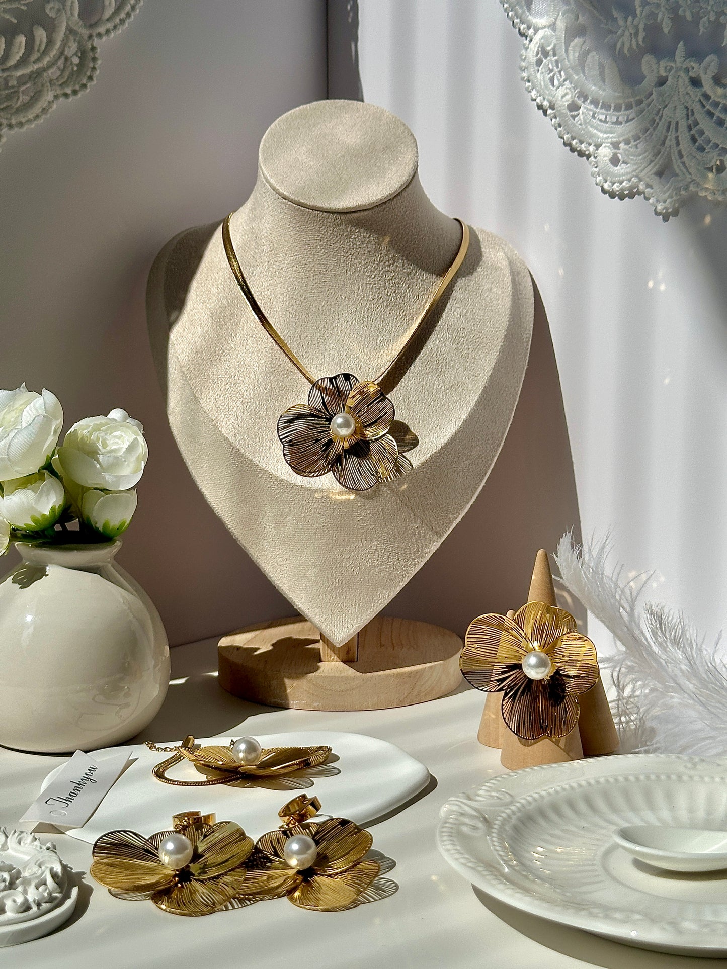 Explosive minimalist flower hollow pearl eye forest tie pure style necklace earrings ring titanium steel