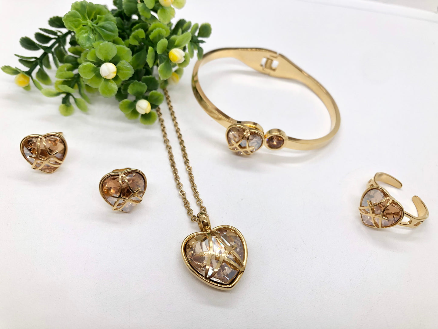 Gorgeous women's stainless steel necklace, earrings, bracelet, and ring set
