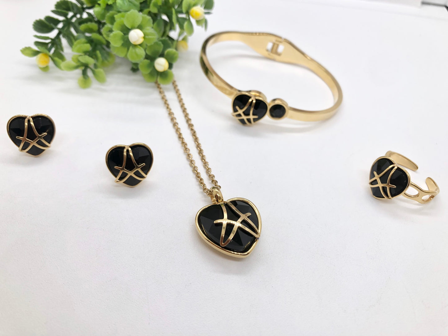 Gorgeous women's stainless steel necklace, earrings, bracelet, and ring set