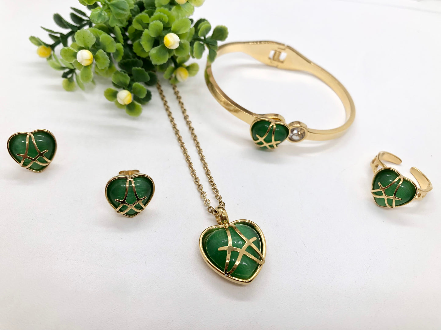 Gorgeous women's stainless steel necklace, earrings, bracelet, and ring set