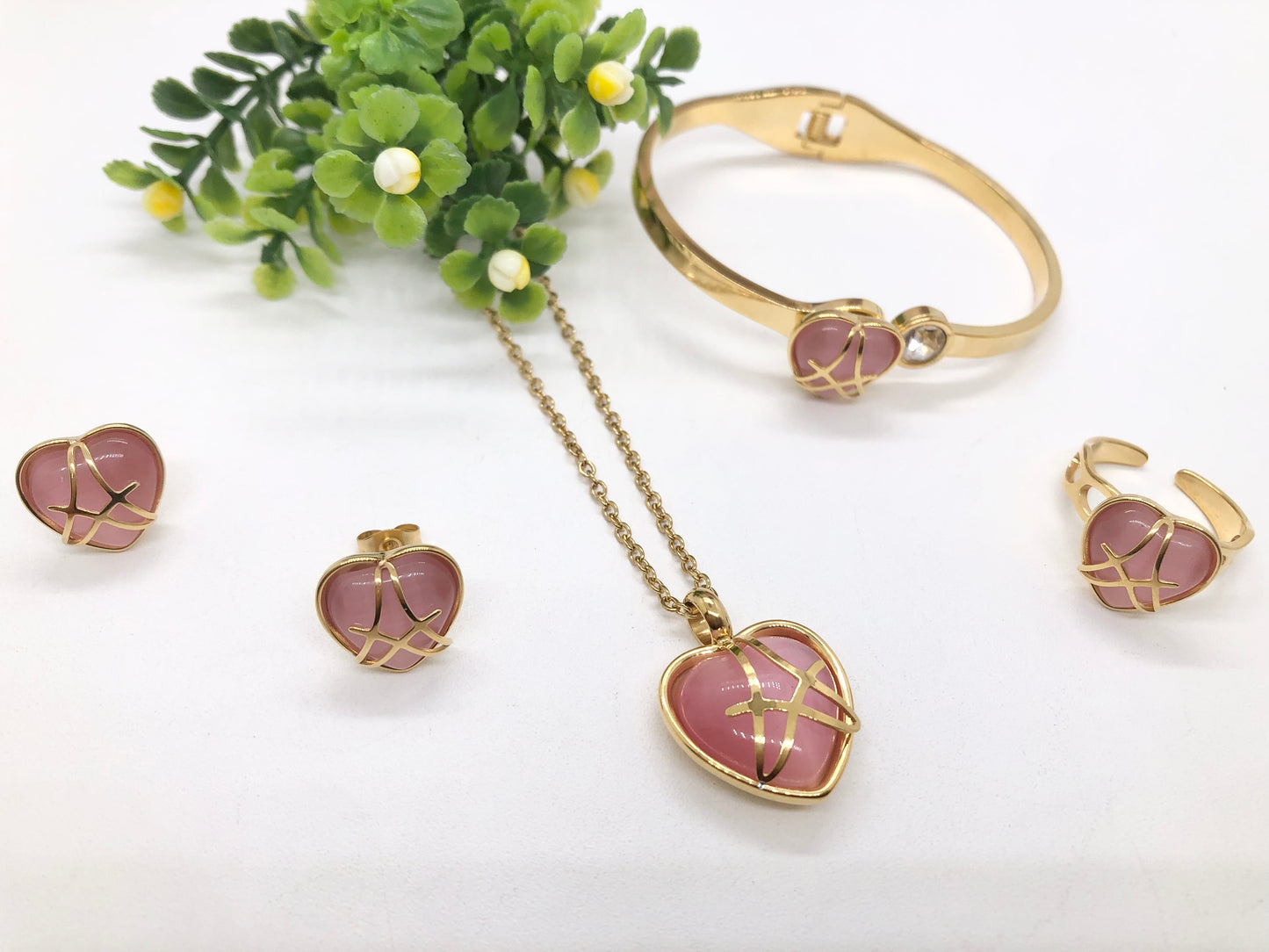 Gorgeous women's stainless steel necklace, earrings, bracelet, and ring set
