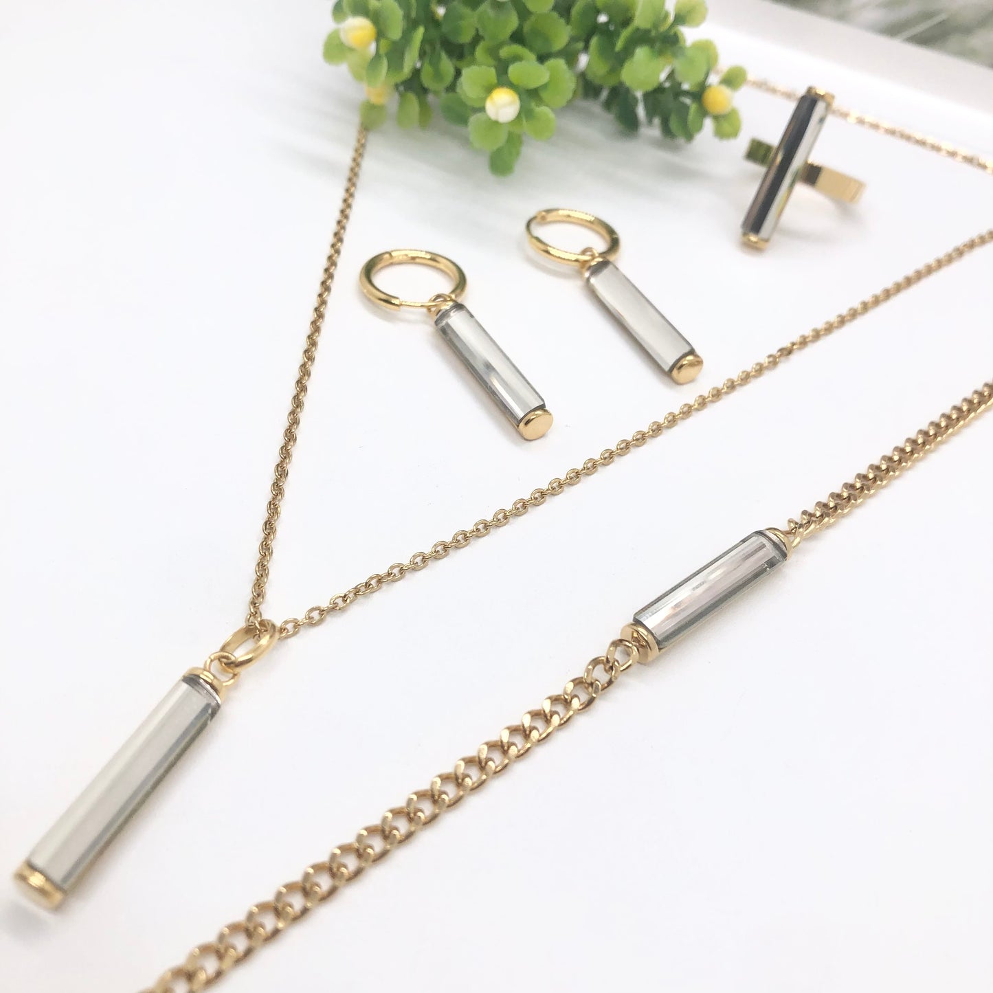 Gorgeous women's stainless steel necklace, earrings, bracelet, and ring set
