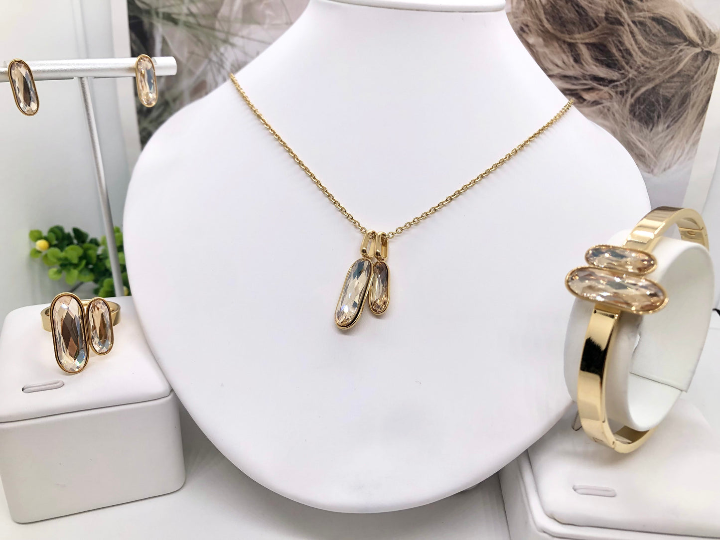 Gorgeous women's stainless steel necklace, earrings, bracelet, and ring set
