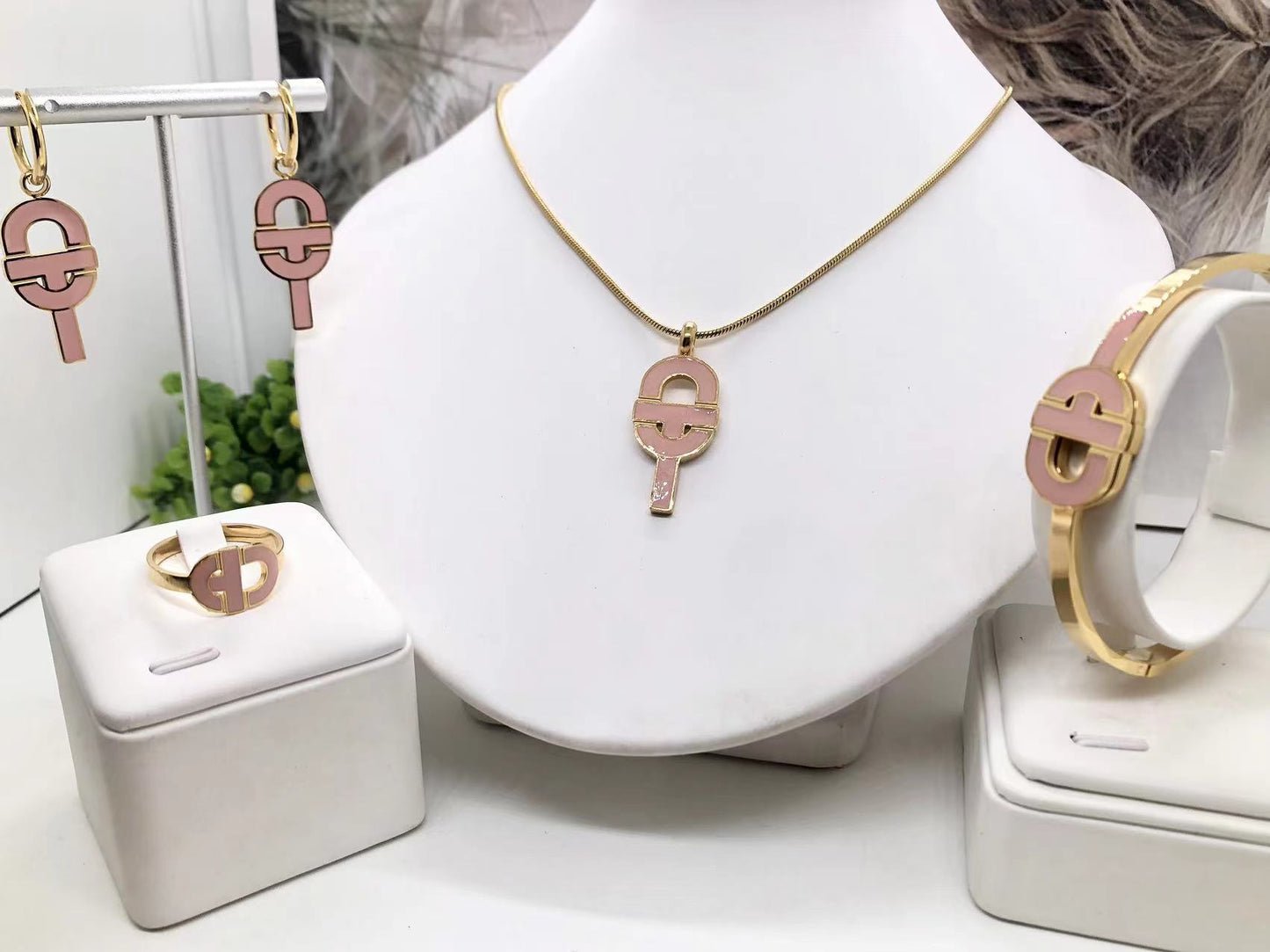 Gorgeous women's stainless steel necklace, earrings, bracelet, and ring set