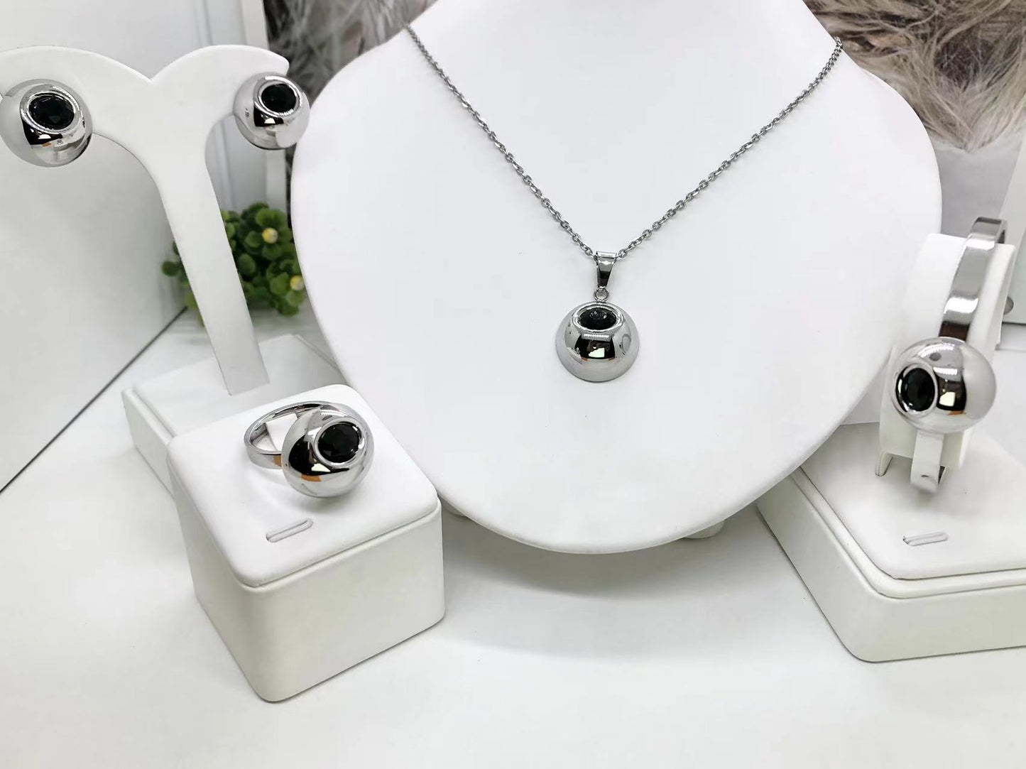 Gorgeous women's stainless steel necklace, earrings, bracelet, and ring set
