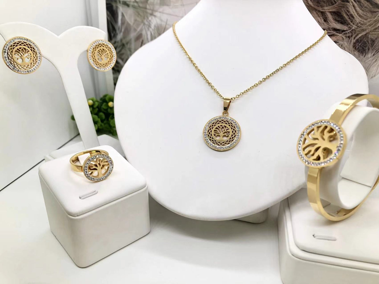 Gorgeous women's stainless steel necklace, earrings, bracelet, and ring set