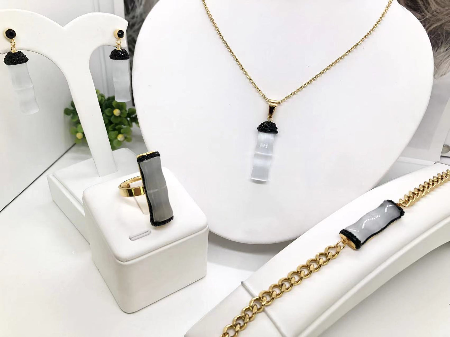 Gorgeous women's stainless steel necklace, earrings, bracelet, and ring set
