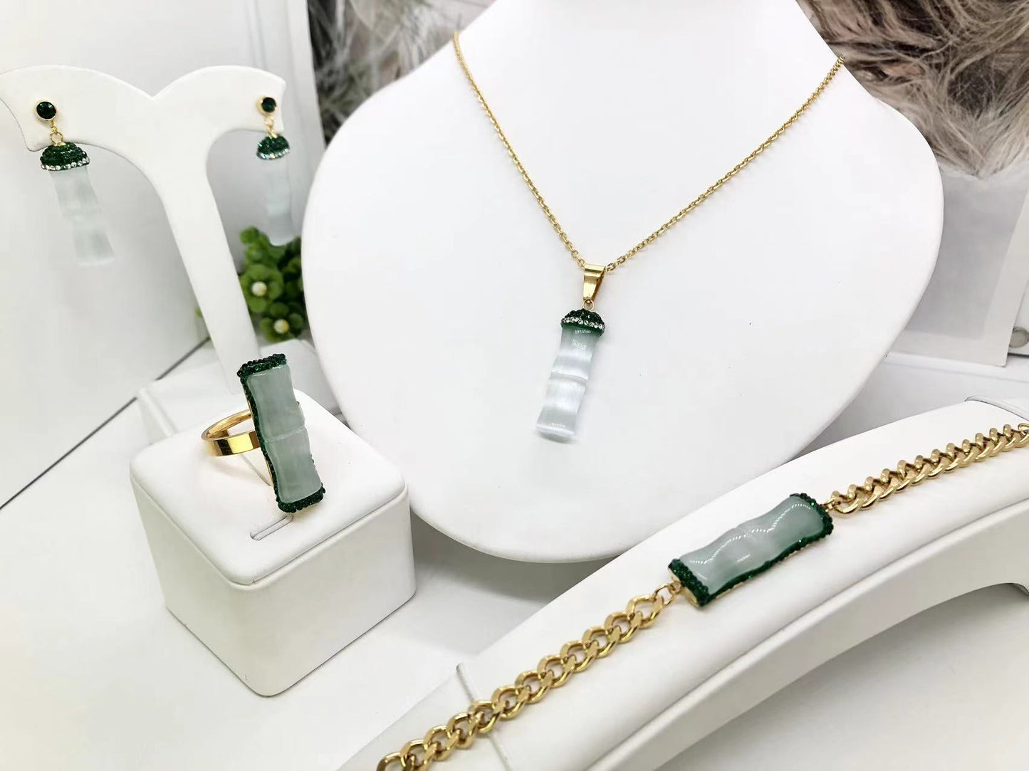 Gorgeous women's stainless steel necklace, earrings, bracelet, and ring set