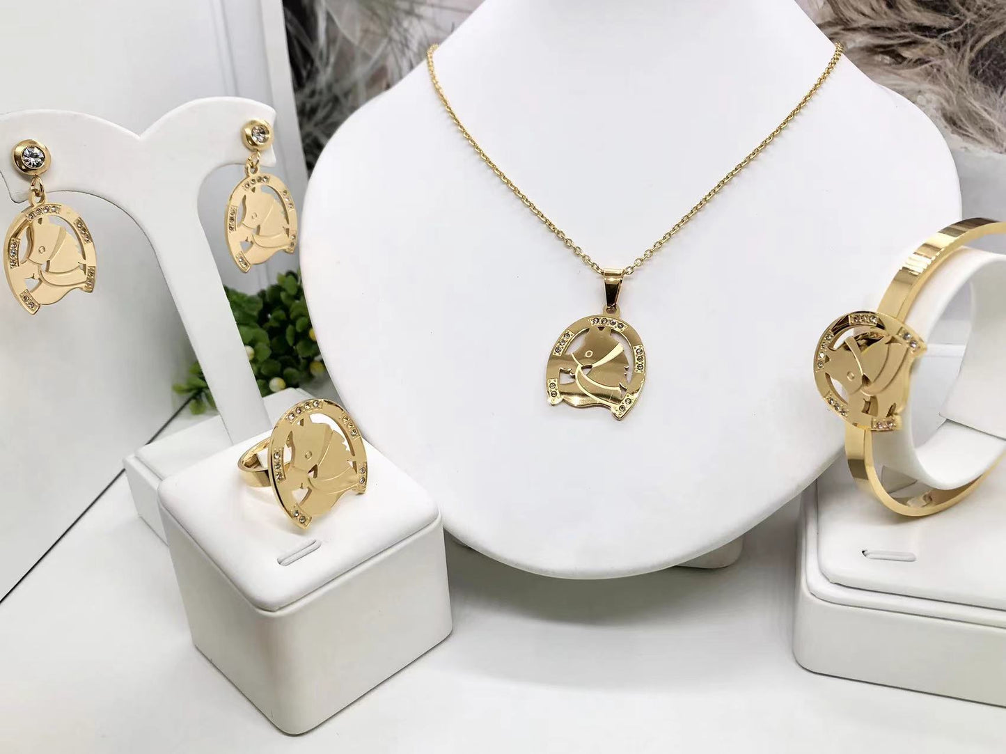 Gorgeous women's stainless steel necklace, earrings, bracelet, and ring set
