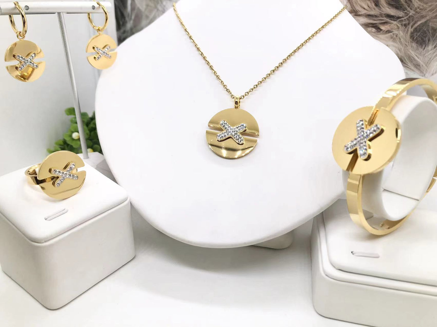 Gorgeous women's stainless steel necklace, earrings, bracelet, and ring set