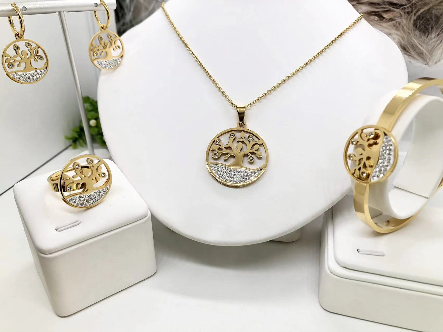 Gorgeous women's stainless steel necklace, earrings, bracelet, and ring set