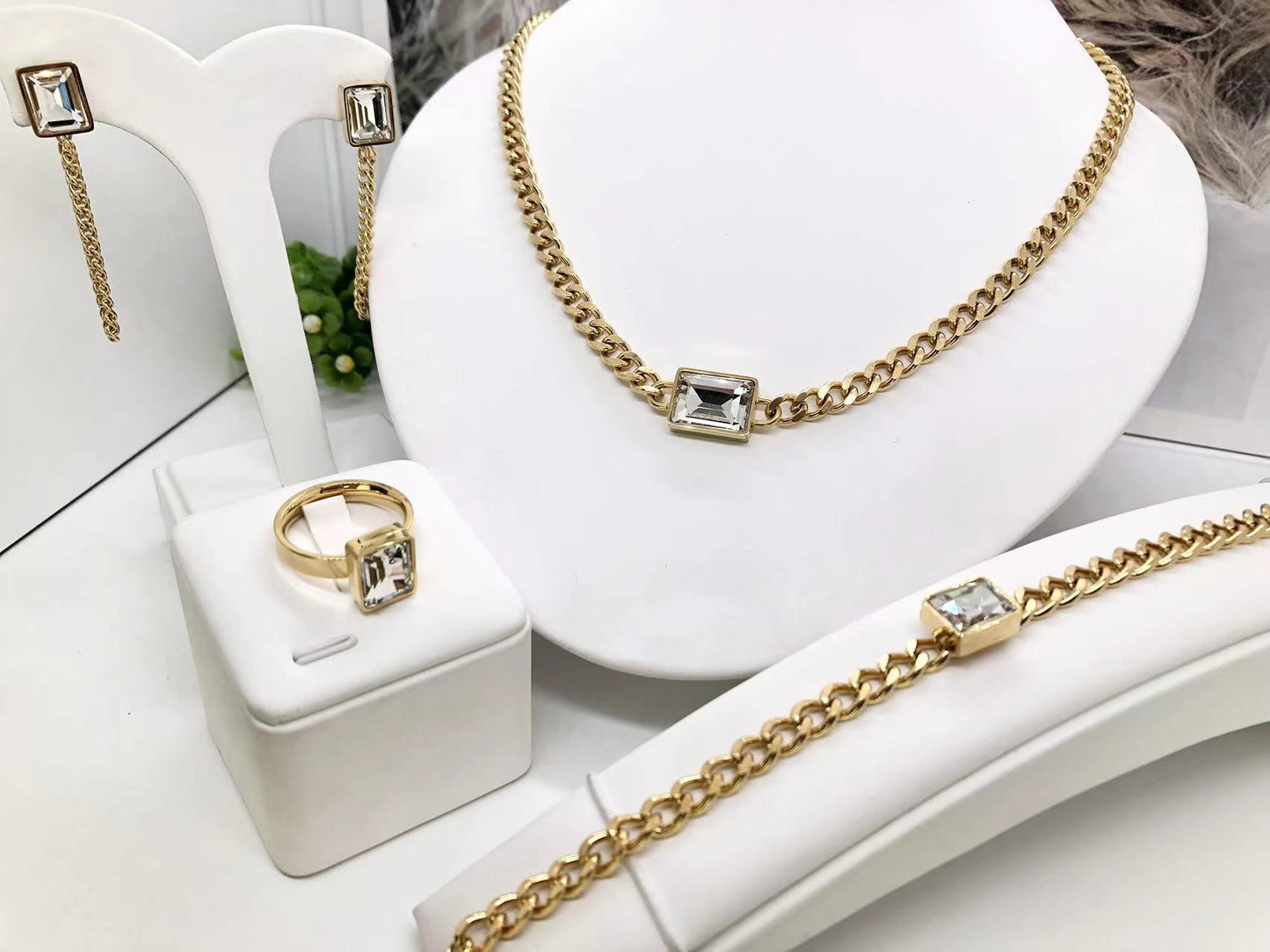 Gorgeous women's stainless steel necklace, earrings, bracelet, and ring set