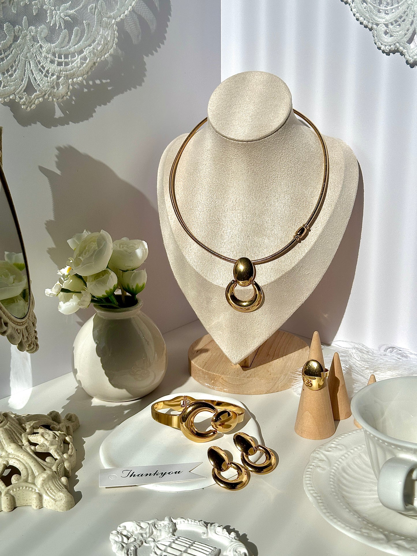 Gorgeous women's stainless steel necklace, earrings, bracelet, and ring set