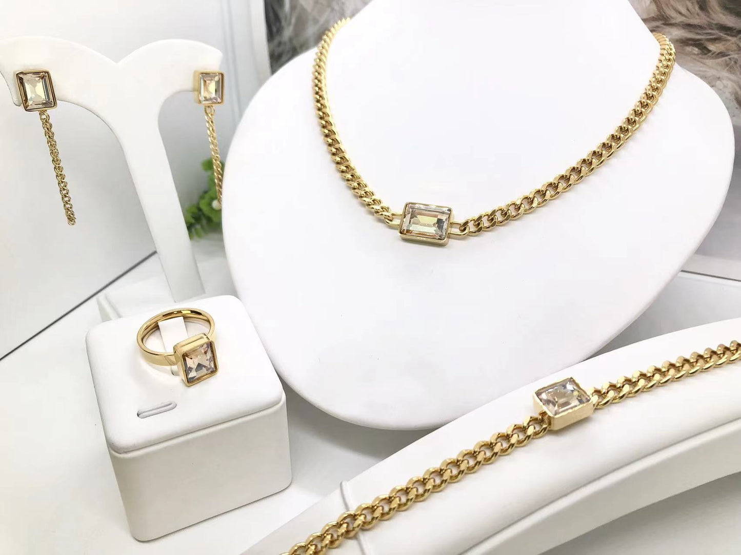 Gorgeous women's stainless steel necklace, earrings, bracelet, and ring set