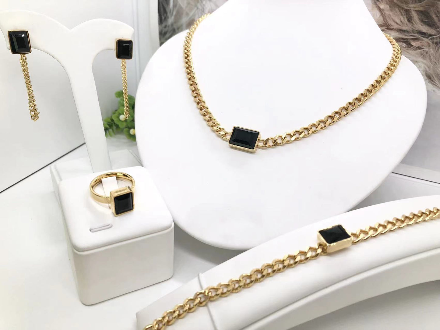Gorgeous women's stainless steel necklace, earrings, bracelet, and ring set