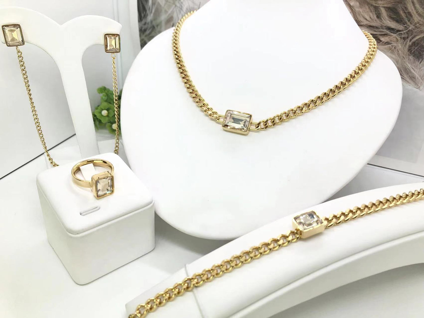 Gorgeous women's stainless steel necklace, earrings, bracelet, and ring set