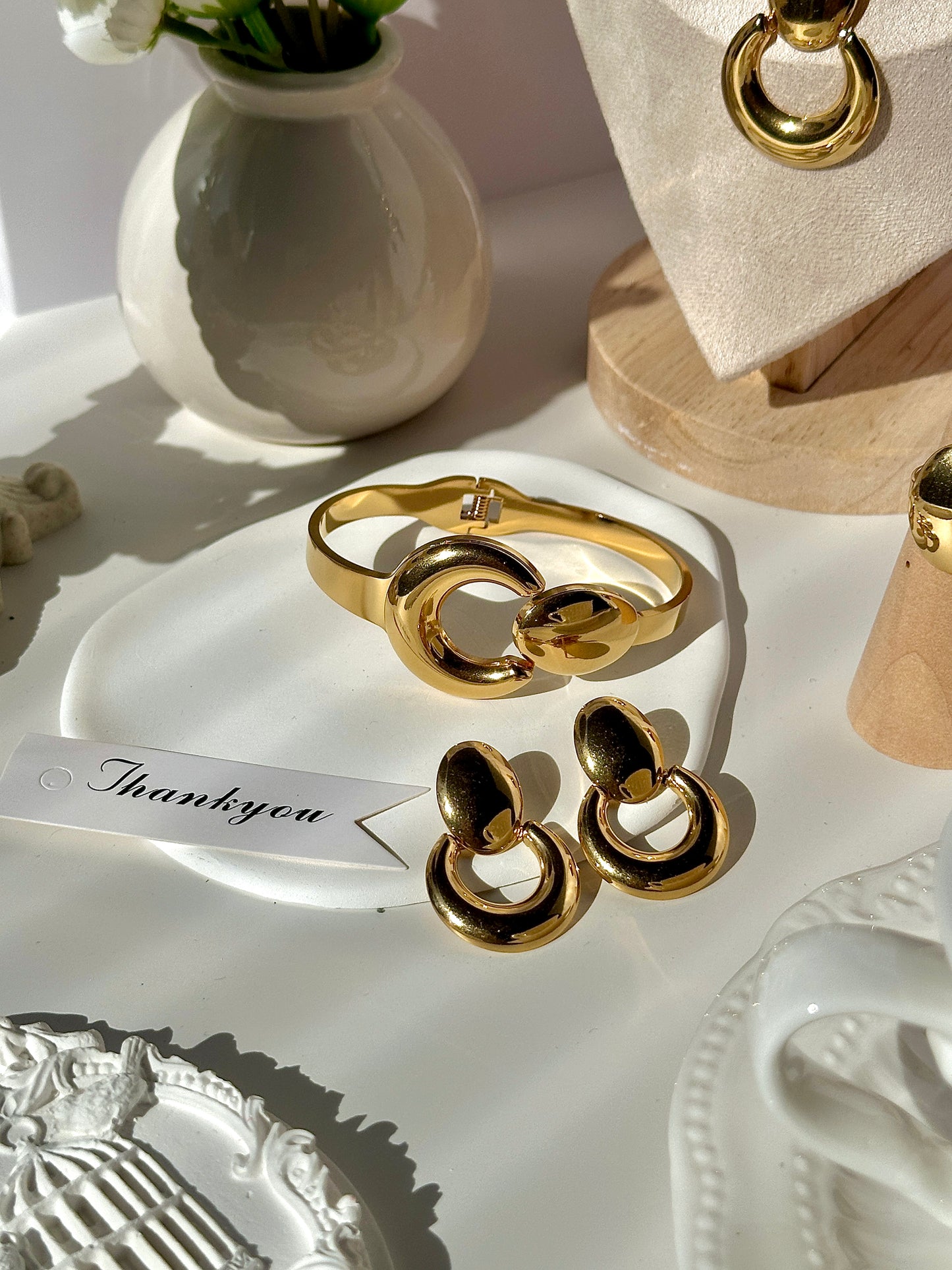 Gorgeous women's stainless steel necklace, earrings, bracelet, and ring set
