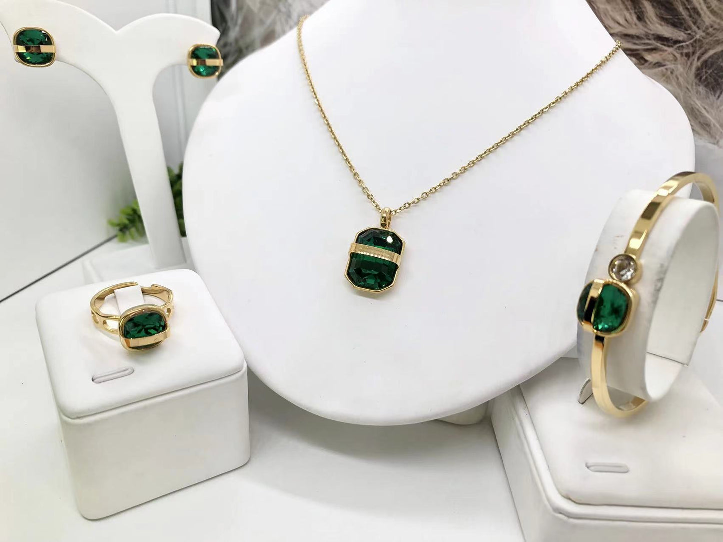 Gorgeous women's stainless steel necklace, earrings, bracelet, and ring set