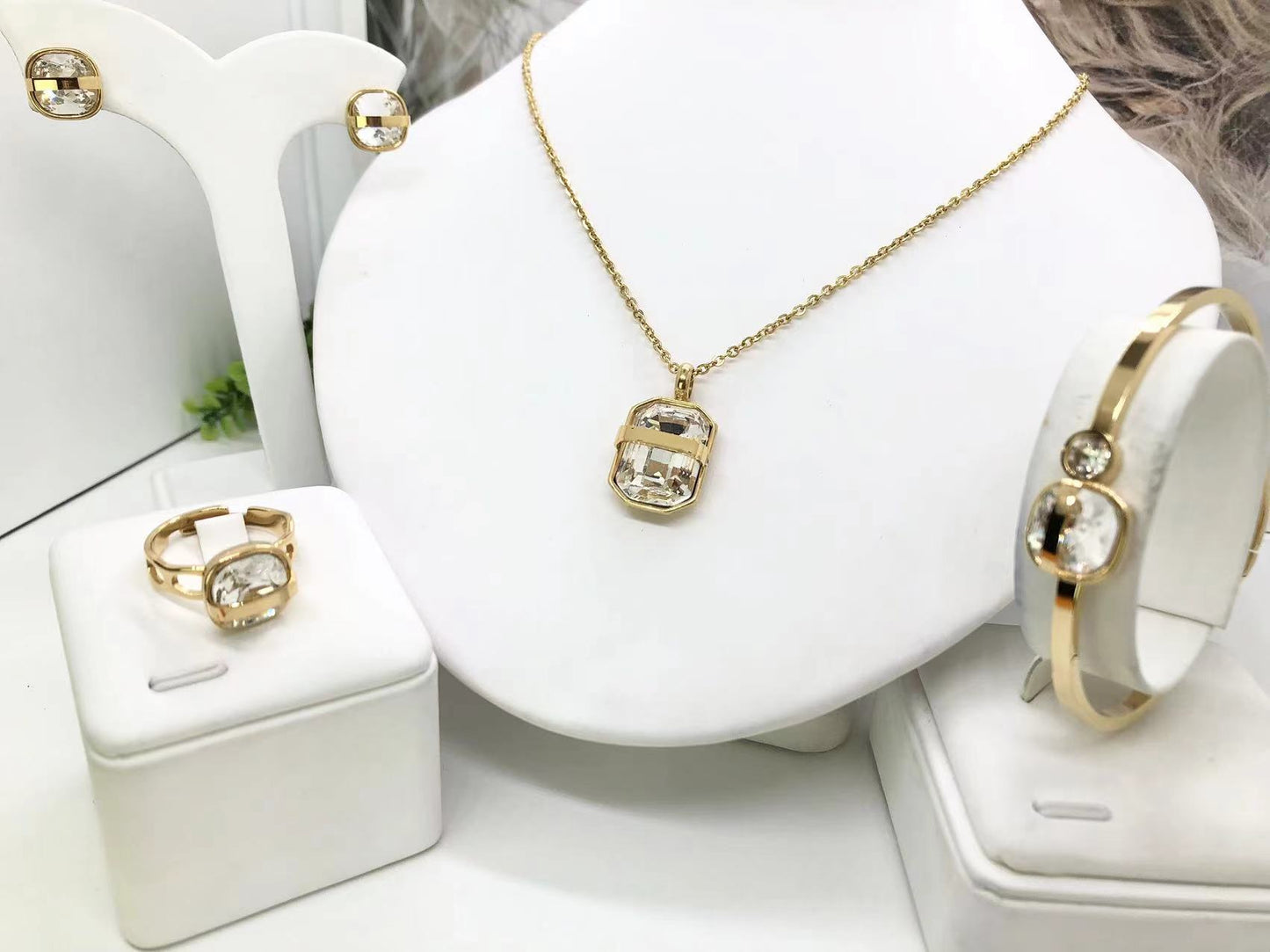Gorgeous women's stainless steel necklace, earrings, bracelet, and ring set