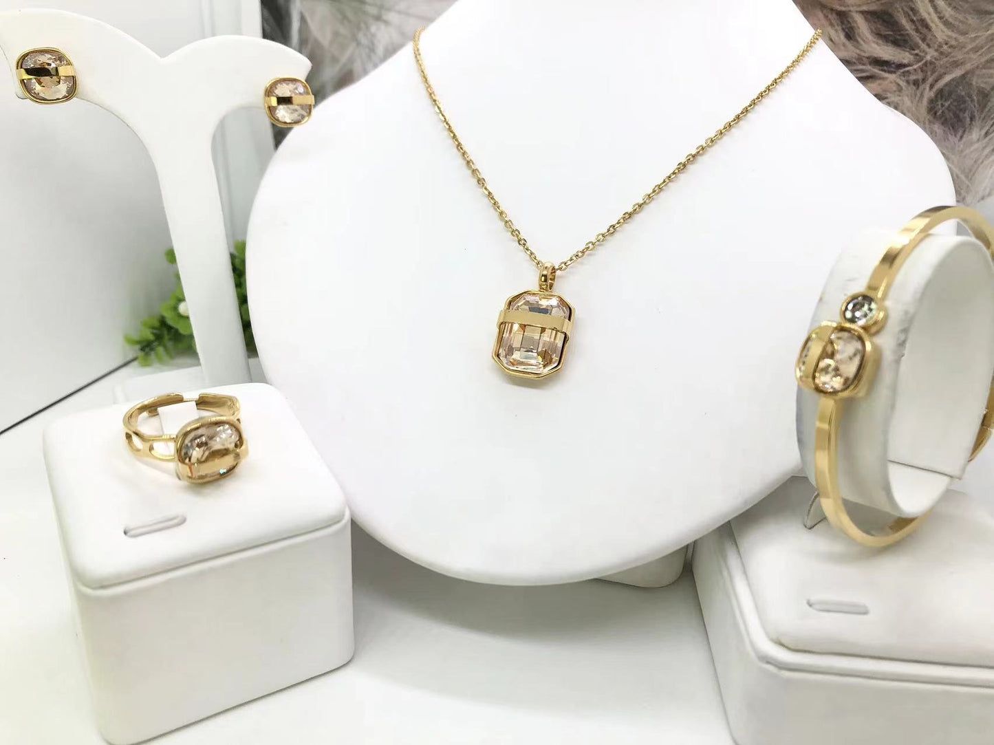 Gorgeous women's stainless steel necklace, earrings, bracelet, and ring set
