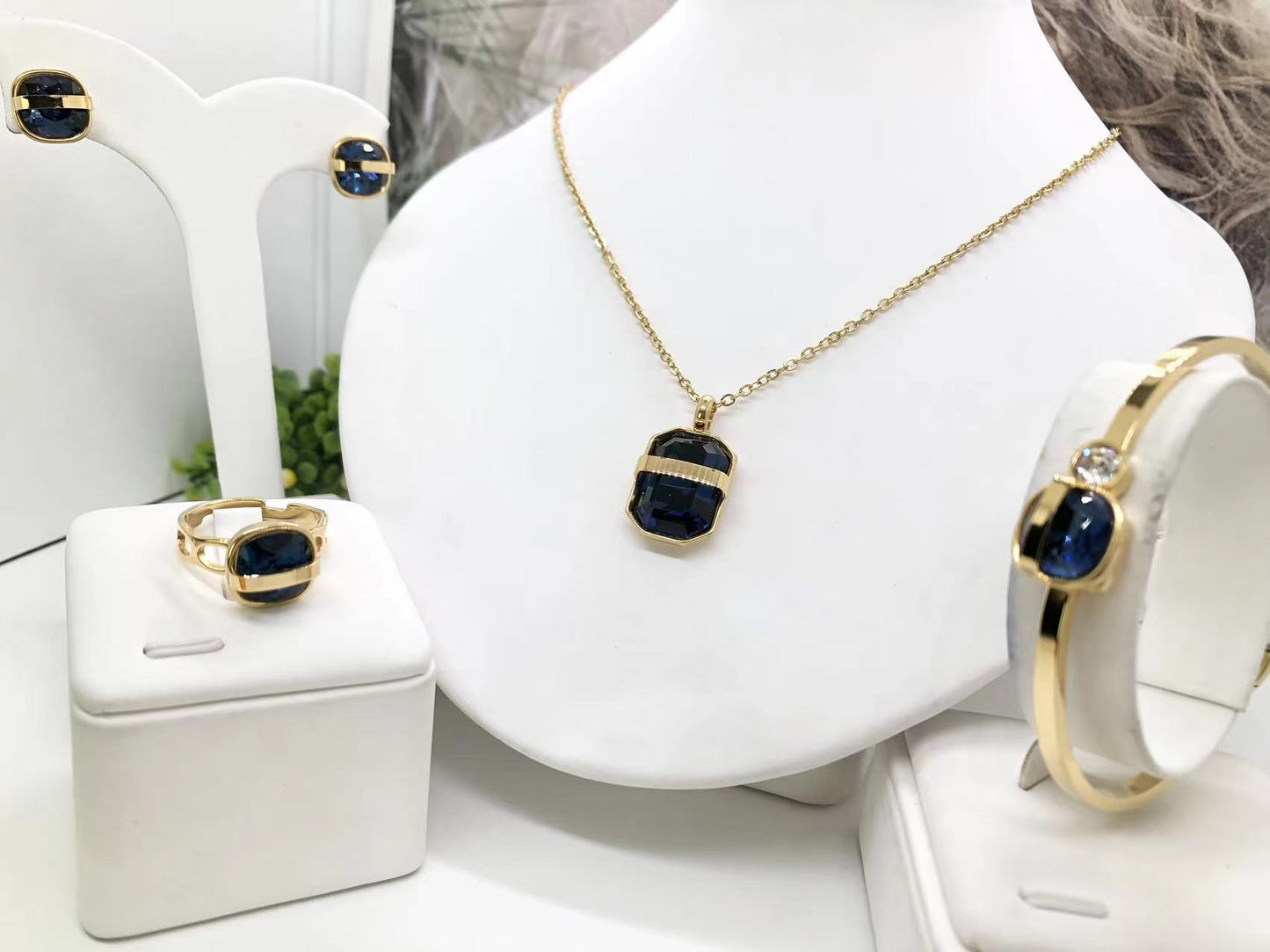 Gorgeous women's stainless steel necklace, earrings, bracelet, and ring set