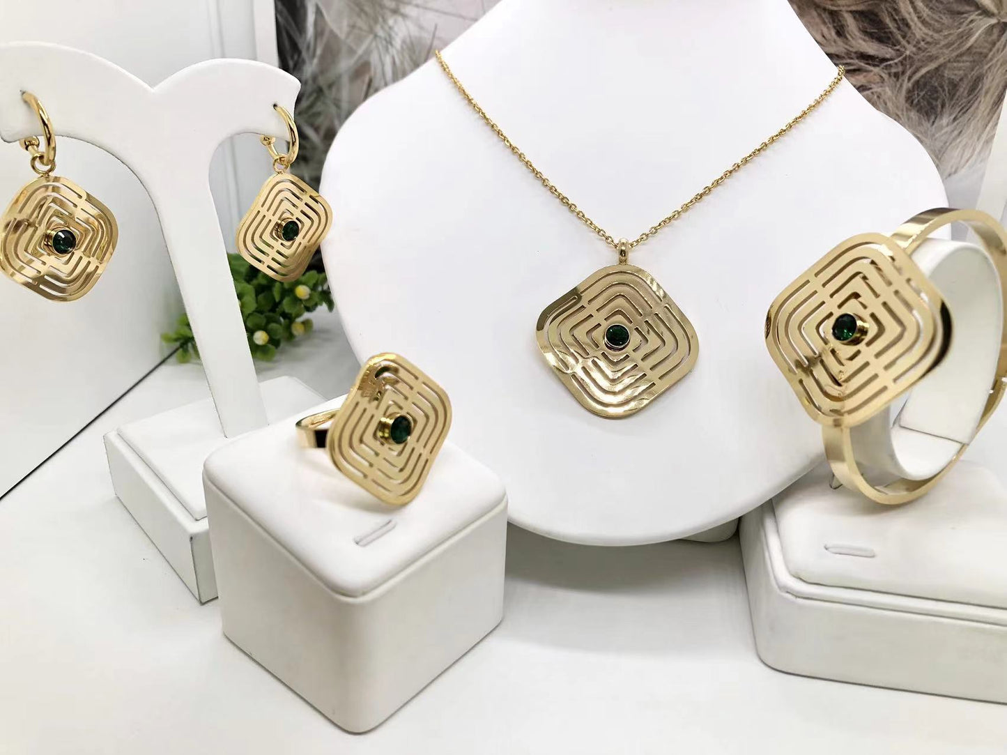 Gorgeous women's stainless steel necklace, earrings, bracelet, and ring set