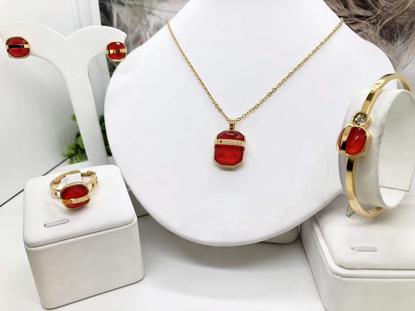 Gorgeous women's stainless steel necklace, earrings, bracelet, and ring set