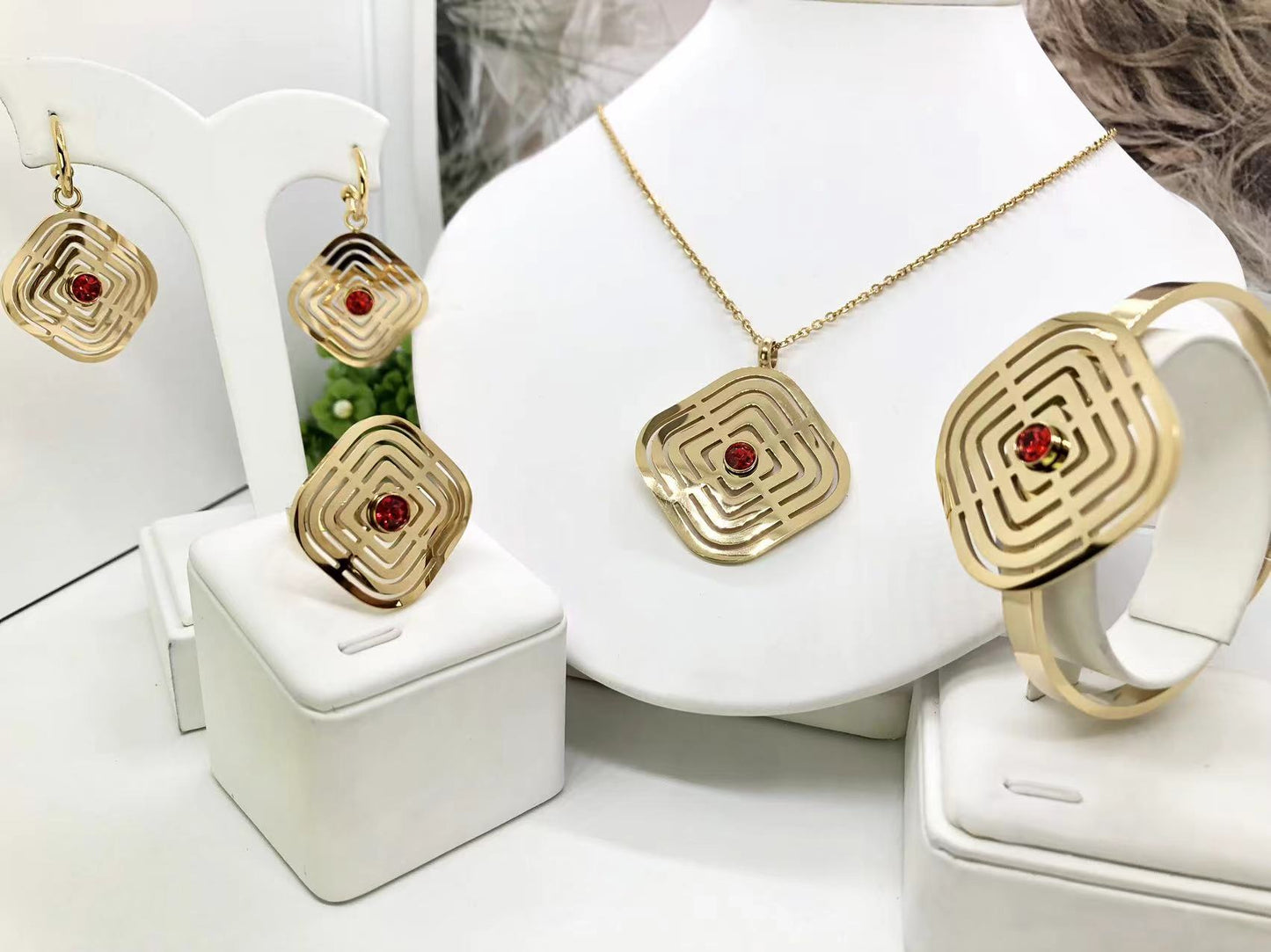 Gorgeous women's stainless steel necklace, earrings, bracelet, and ring set