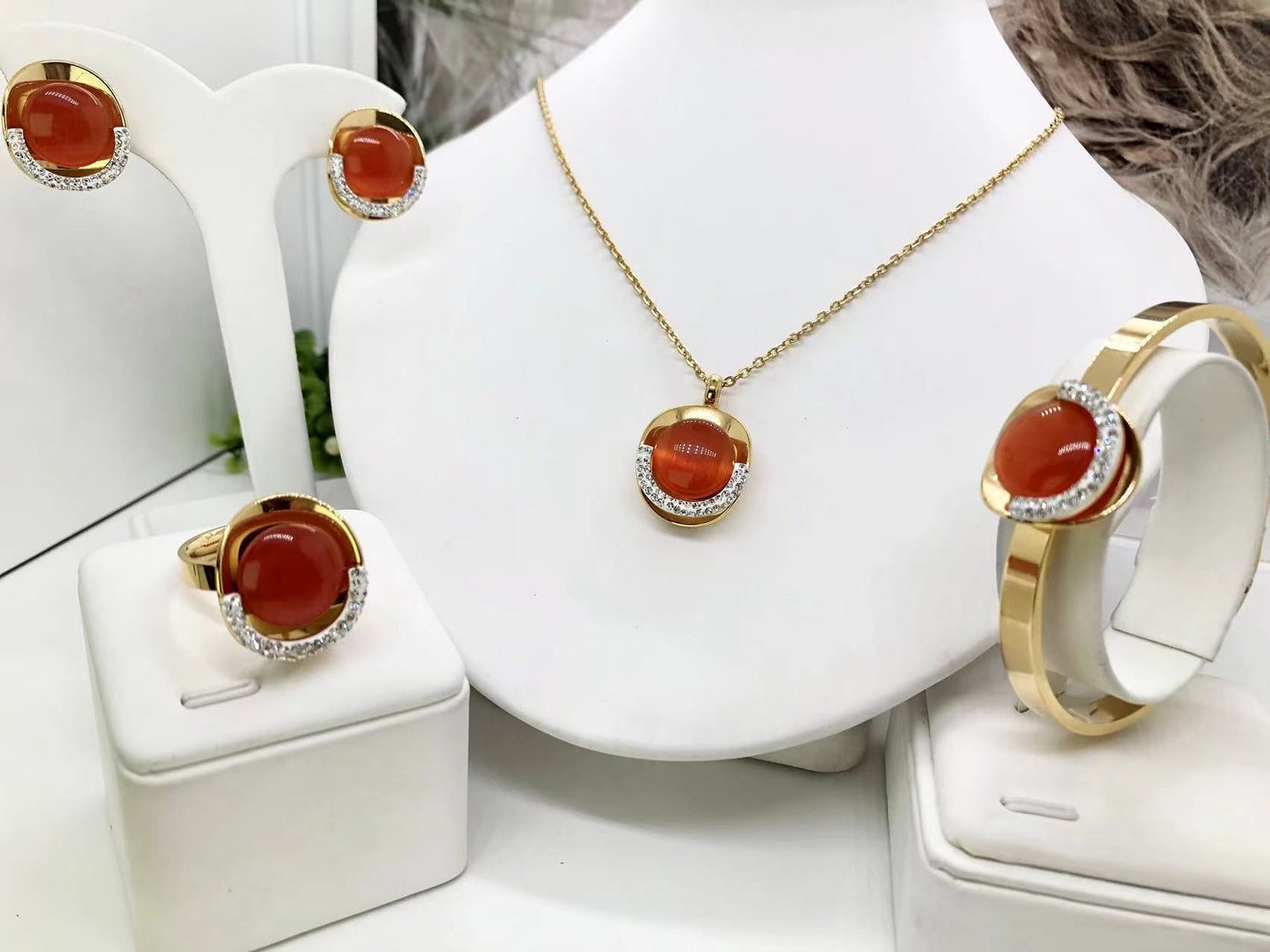 Gorgeous women's stainless steel necklace, earrings, bracelet, and ring set