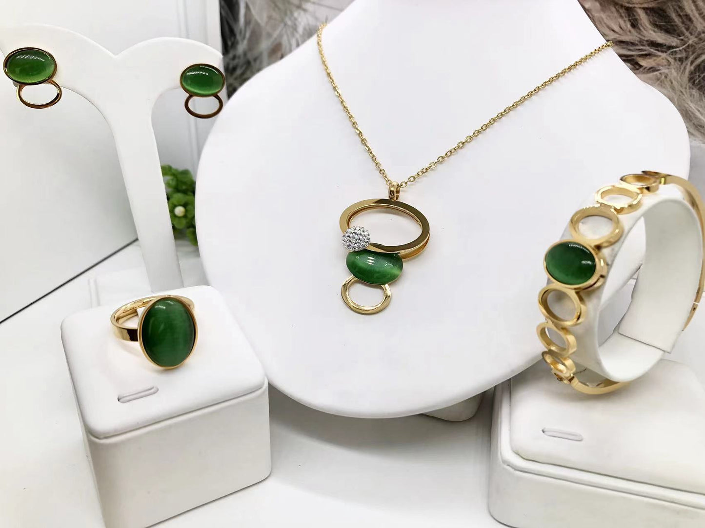 Gorgeous women's stainless steel necklace, earrings, bracelet, and ring set