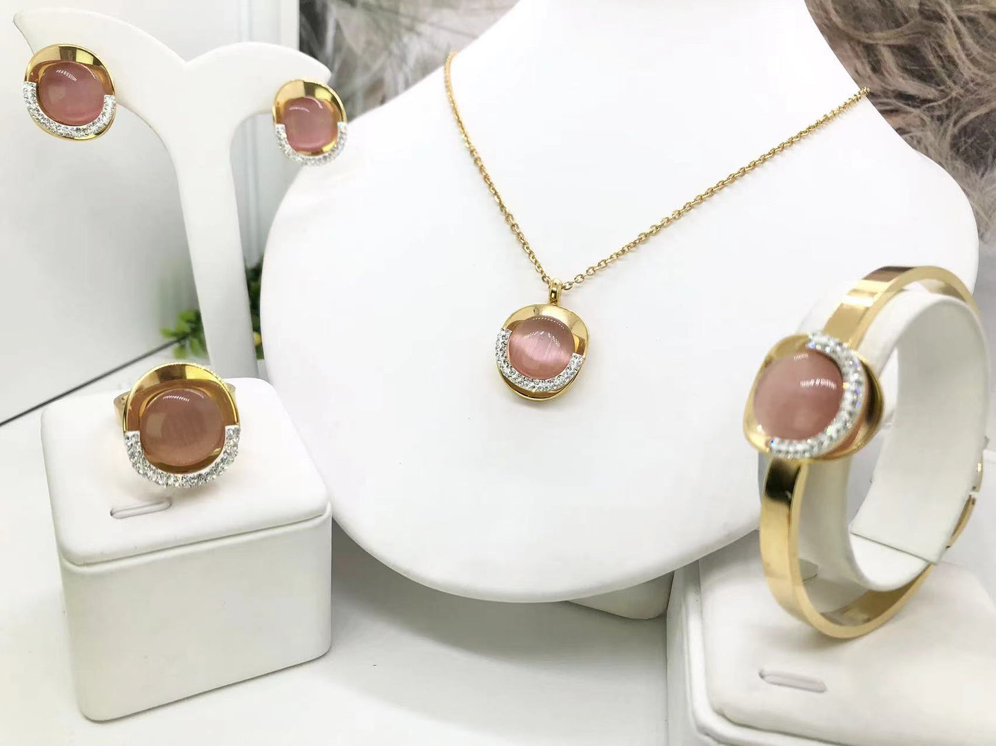 Gorgeous women's stainless steel necklace, earrings, bracelet, and ring set