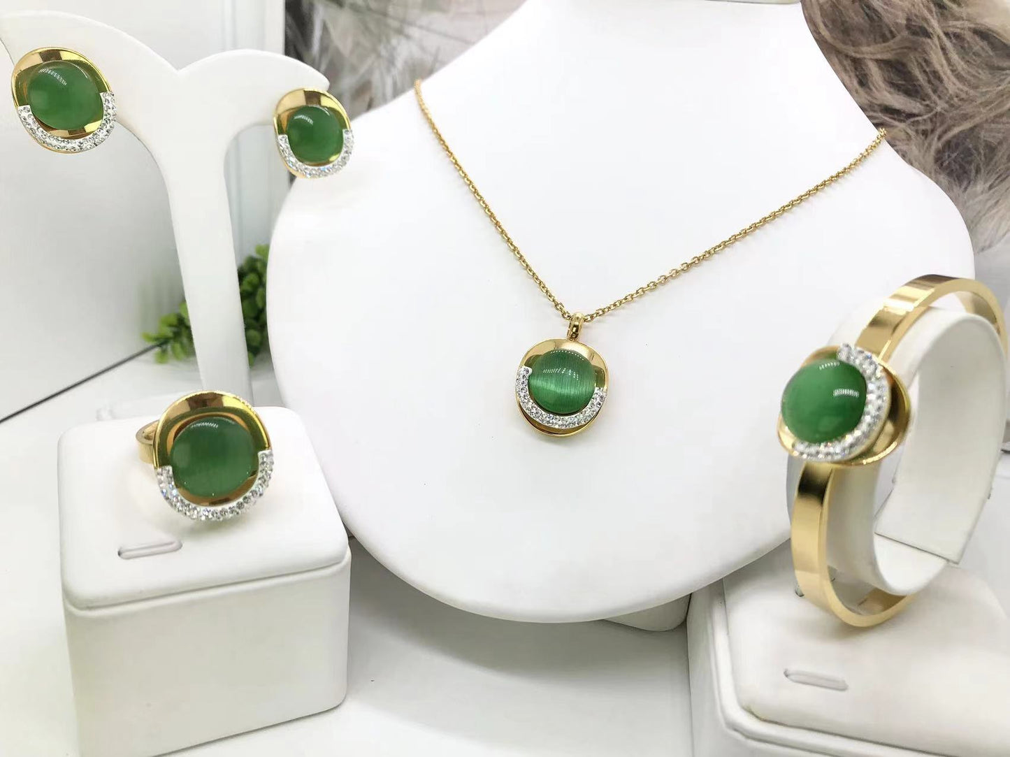 Gorgeous women's stainless steel necklace, earrings, bracelet, and ring set