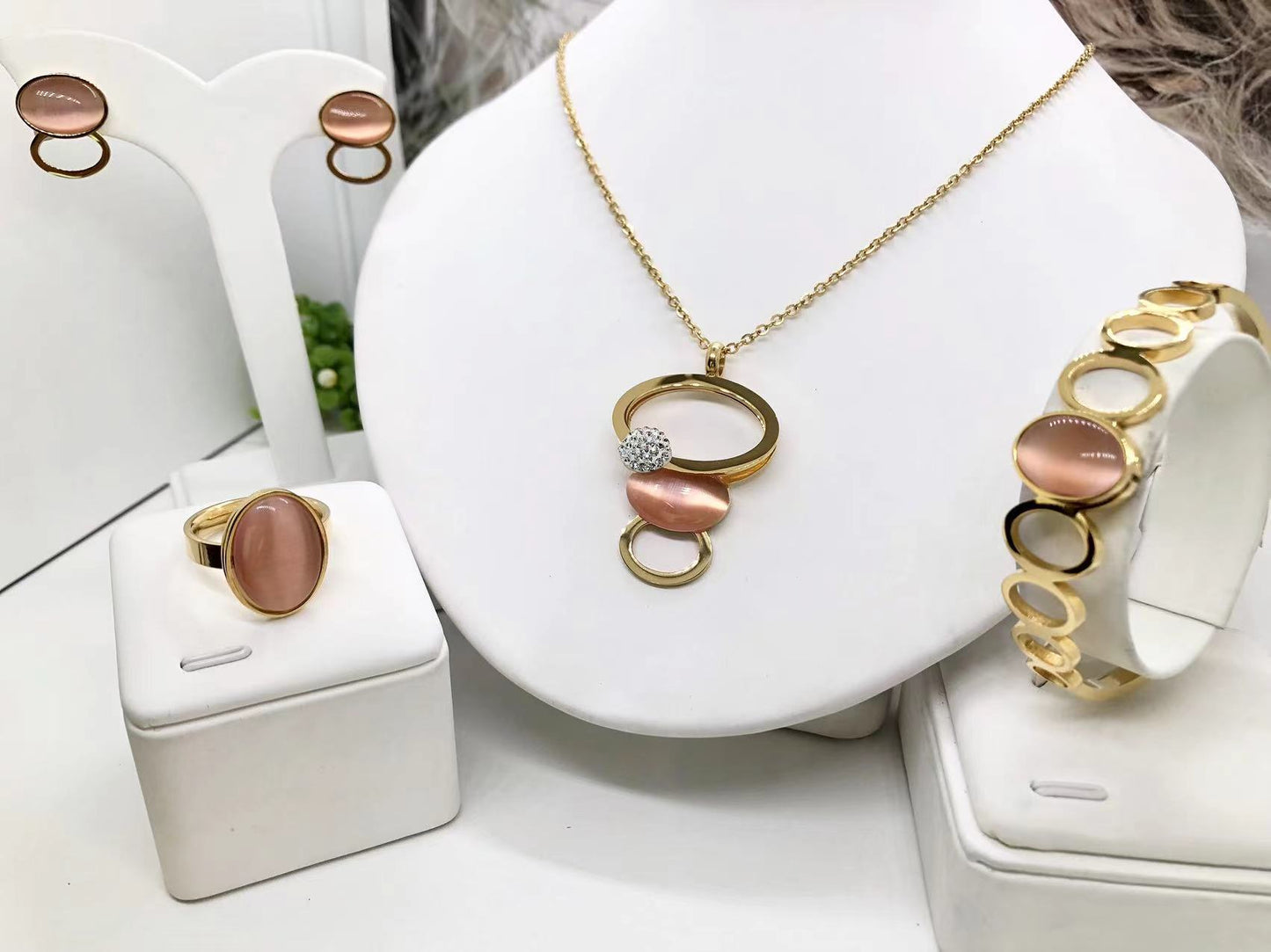Gorgeous women's stainless steel necklace, earrings, bracelet, and ring set
