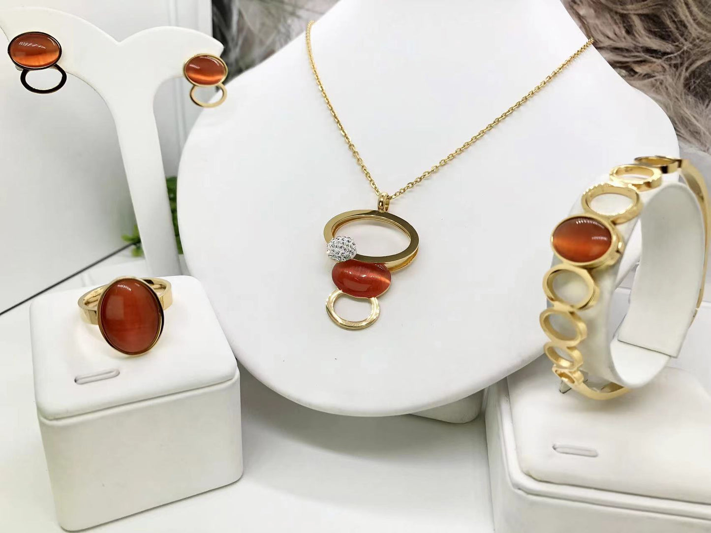 Gorgeous women's stainless steel necklace, earrings, bracelet, and ring set