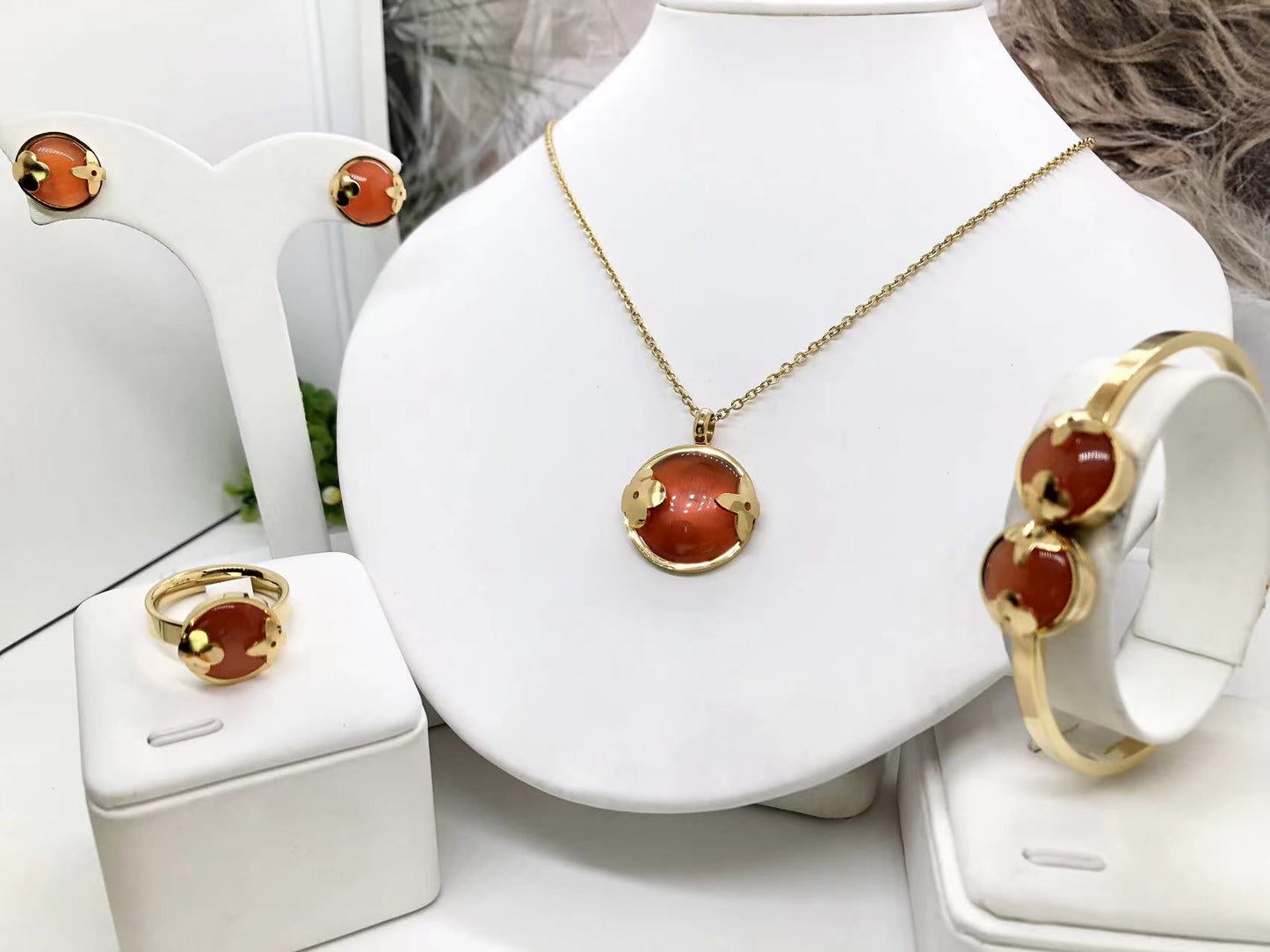Gorgeous women's stainless steel necklace, earrings, bracelet, and ring set