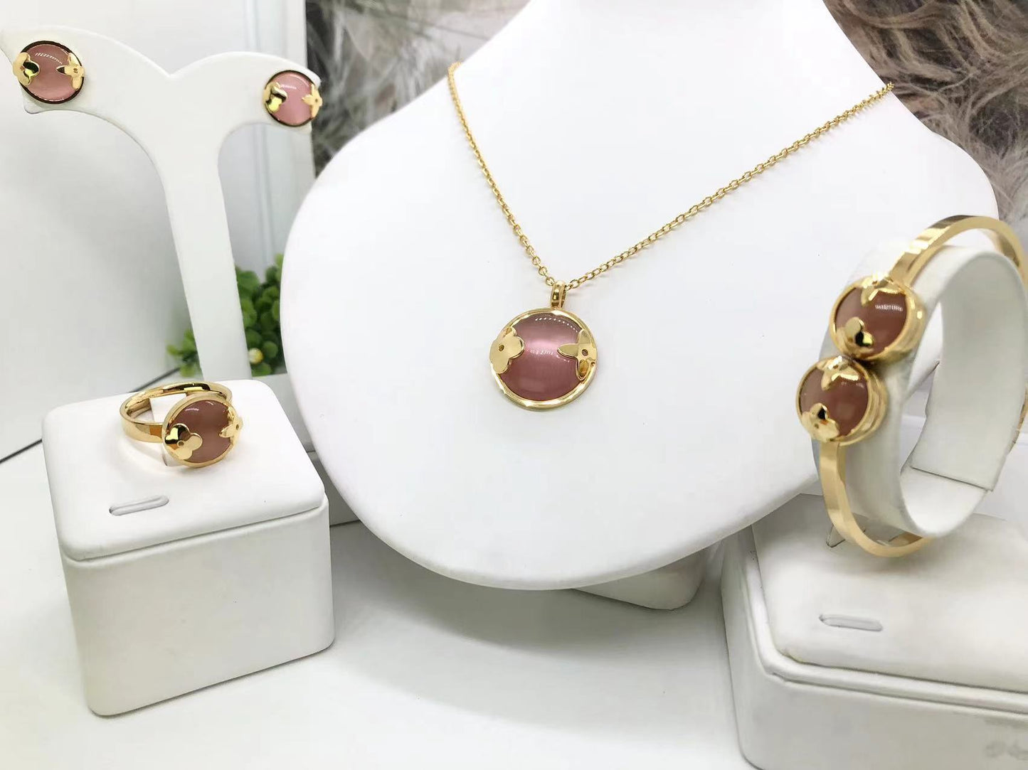 Gorgeous women's stainless steel necklace, earrings, bracelet, and ring set