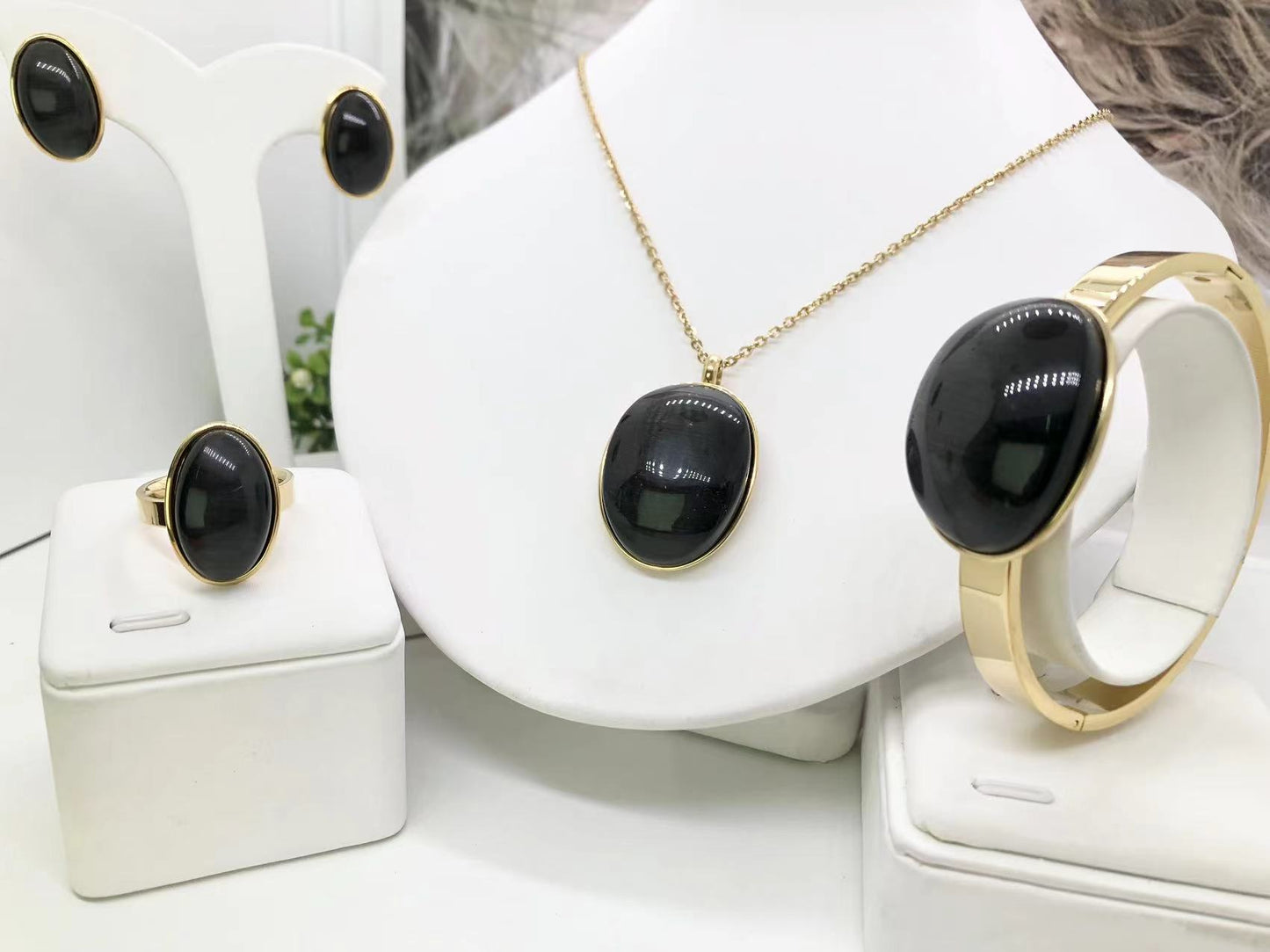 Gorgeous women's stainless steel necklace, earrings, bracelet, and ring set