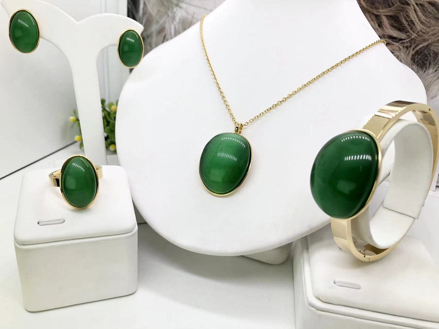 Gorgeous women's stainless steel necklace, earrings, bracelet, and ring set