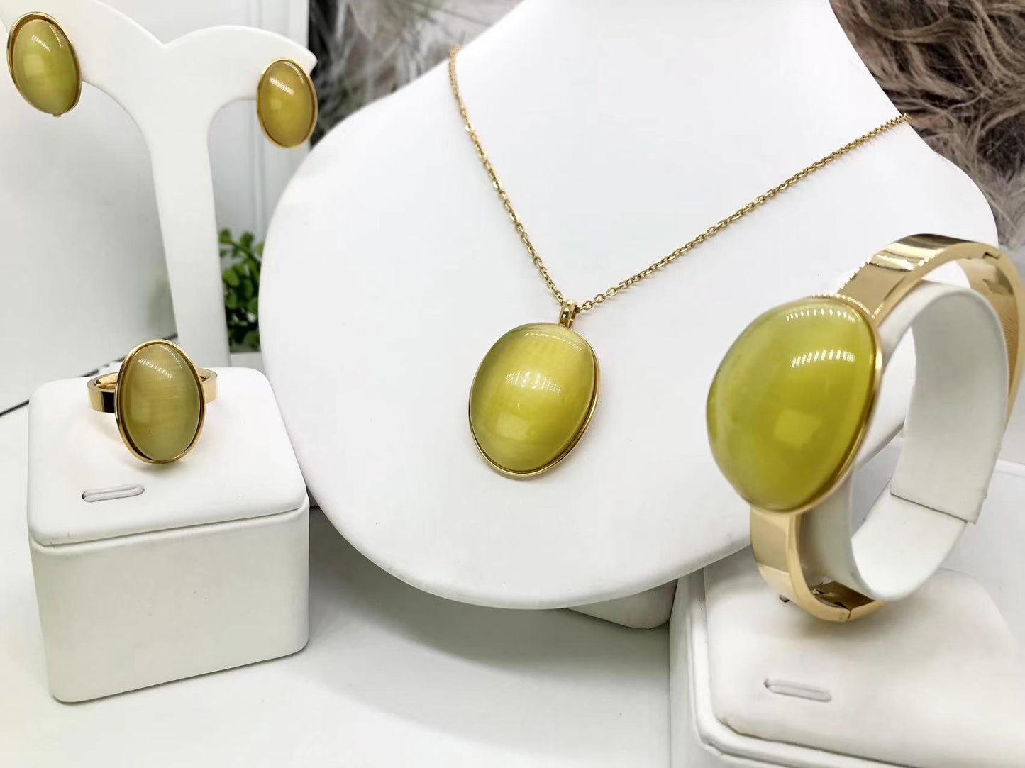 Gorgeous women's stainless steel necklace, earrings, bracelet, and ring set