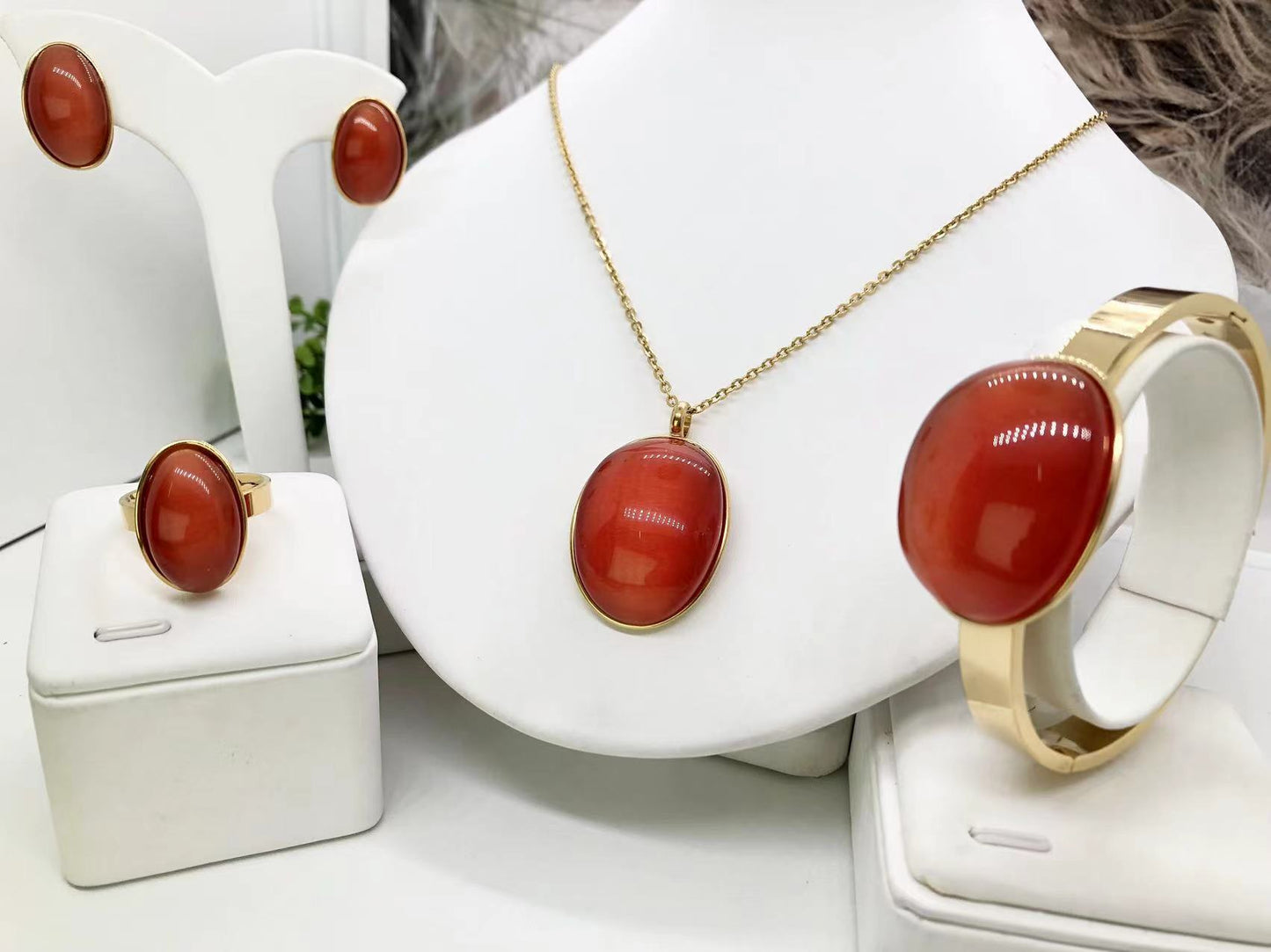 Gorgeous women's stainless steel necklace, earrings, bracelet, and ring set