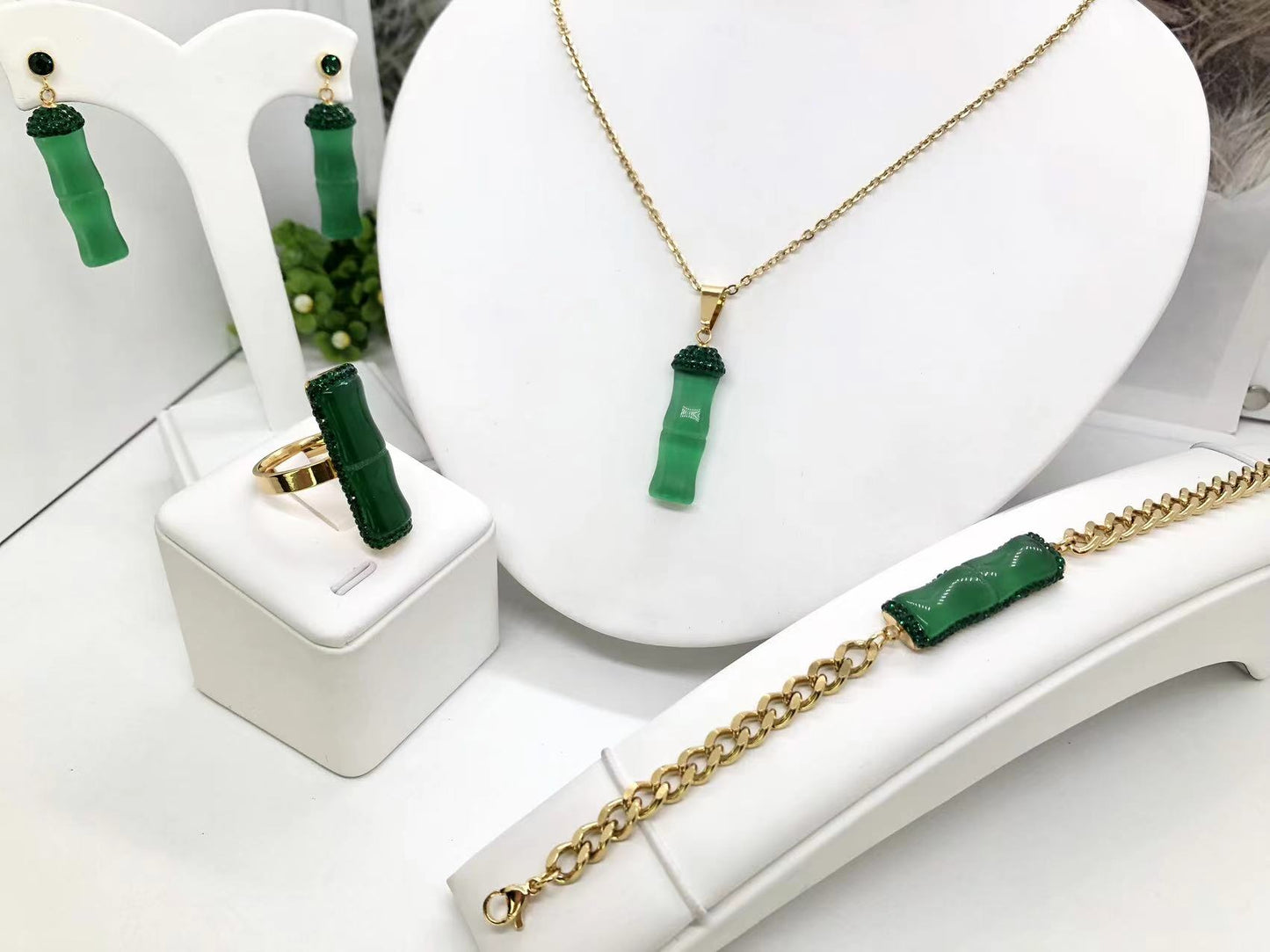 Gorgeous women's stainless steel necklace, earrings, bracelet, and ring set