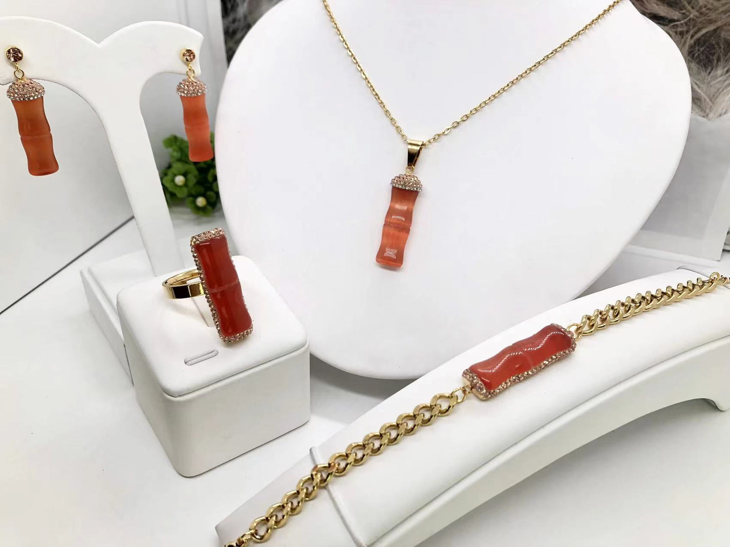Gorgeous women's stainless steel necklace, earrings, bracelet, and ring set