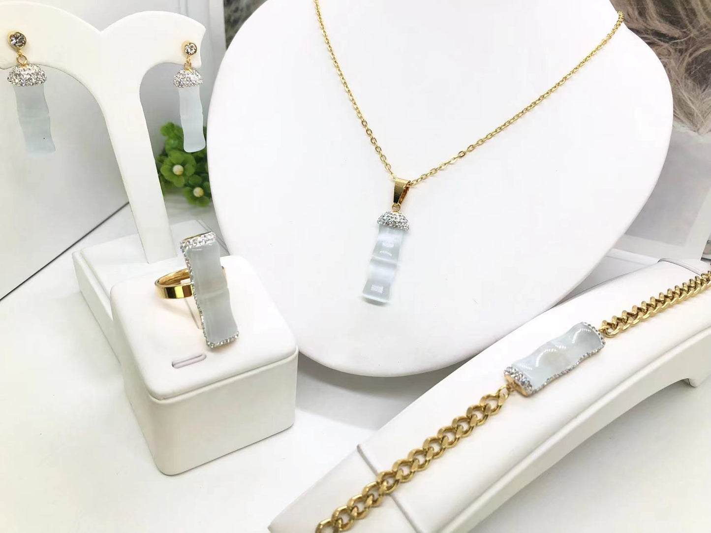 Gorgeous women's stainless steel necklace, earrings, bracelet, and ring set
