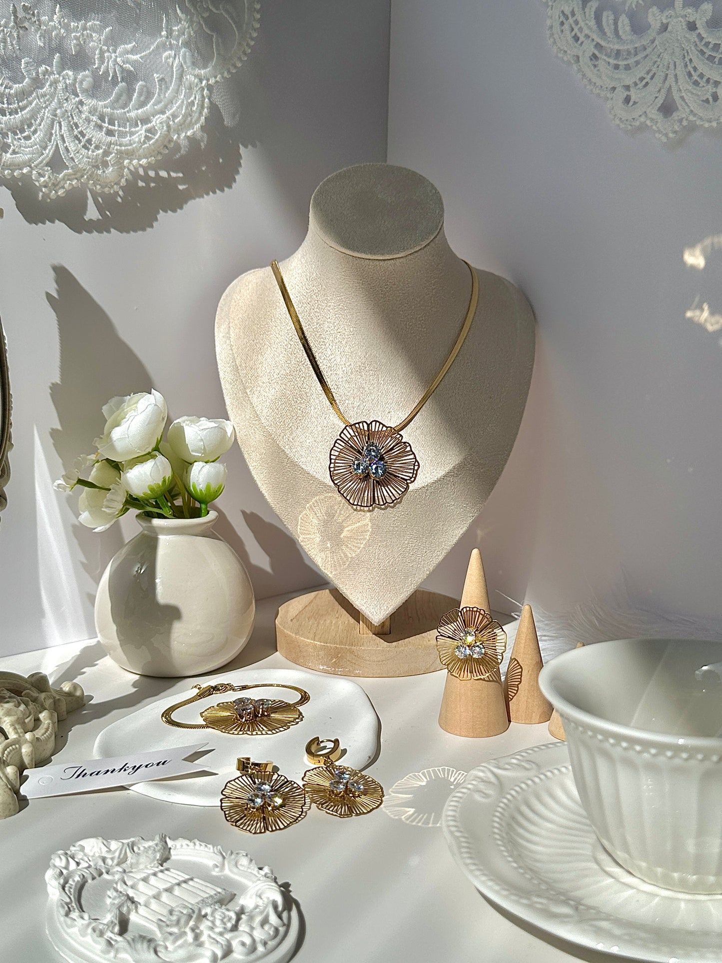Gorgeous women's stainless steel necklace, earrings, bracelet, and ring set