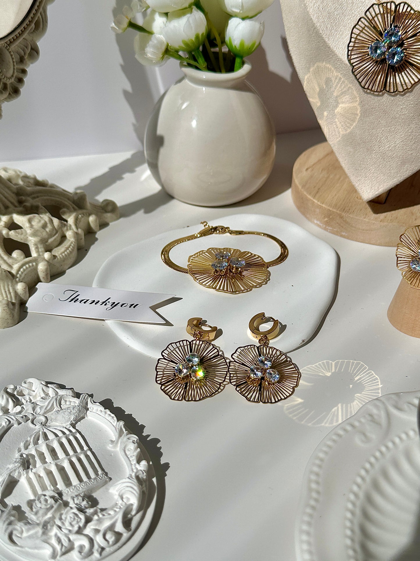 Gorgeous women's stainless steel necklace, earrings, bracelet, and ring set